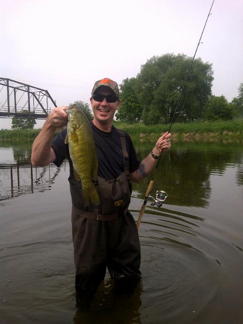 Grand River Smallie.jpg - Ian with a Smallmouth from the Grand River.